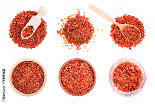 Aromatic spices. Red chili pepper flakes on white background, top view