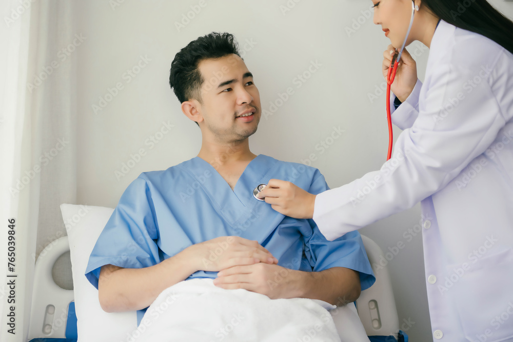 Fototapeta premium A man is being checked by a doctor