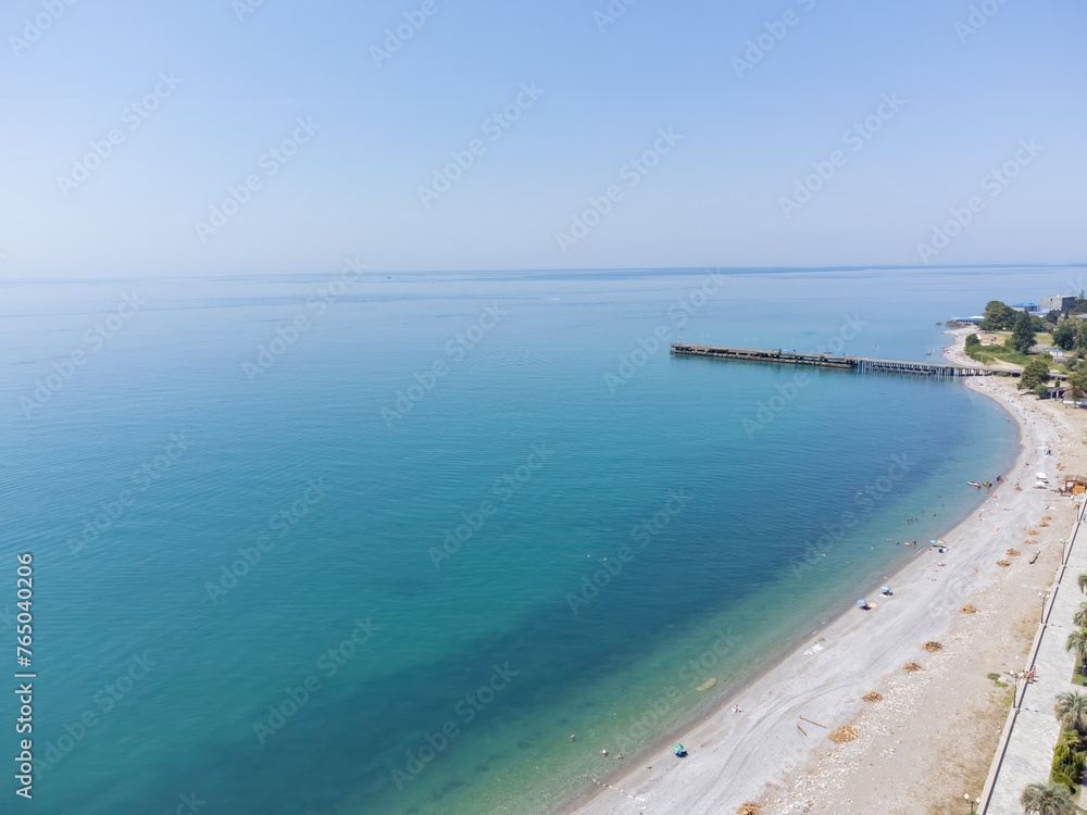 Bird's-eye view of the sea embankment and blue sky