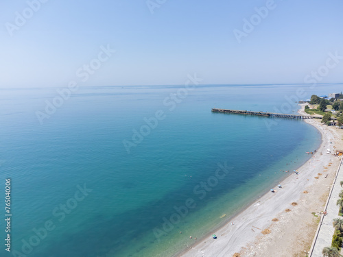 Bird s-eye view of the sea embankment and blue sky