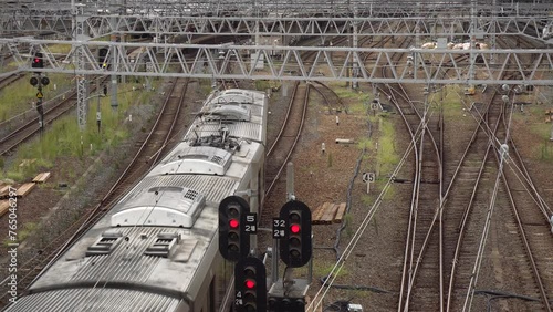 Wallpaper Mural Japanese Commuter Train Arriving at Rail Yard of Station wtih Railway Traffic Signals - Top-down View Torontodigital.ca