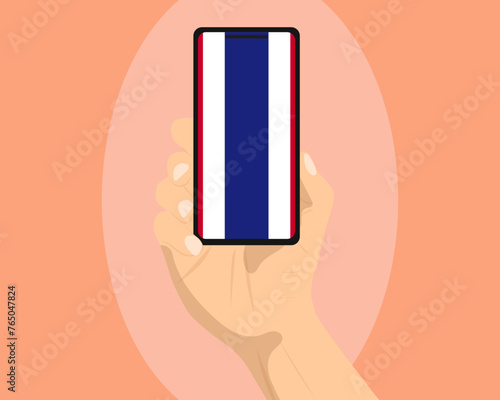 Thailand flag on mobile phone screen, holding smartphone, advertising social media or banner concept