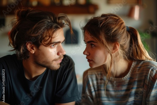 Emotional stressed young couple having argument at home. Portrait of angry irritated man and woman talking and looking at each other with annoyed. Relationship problems, family, Generative AI