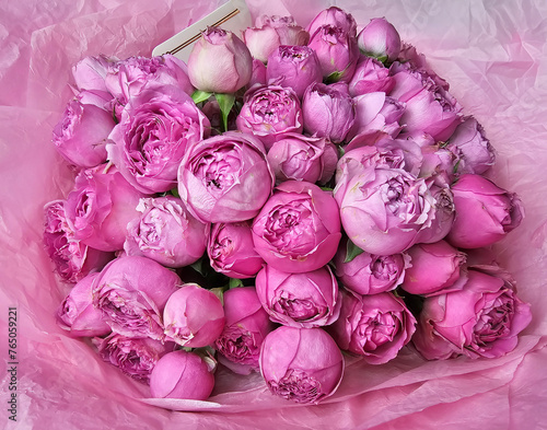 A close-up of a beautiful bouquet of pink peony roses.  Fresh spring bouquet. Flower concept. 