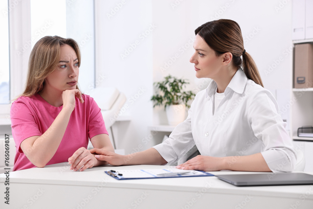 Mammologist's appointment. Doctor and woman in hospital Mammologist's appointment. Doctor and woman in hospital