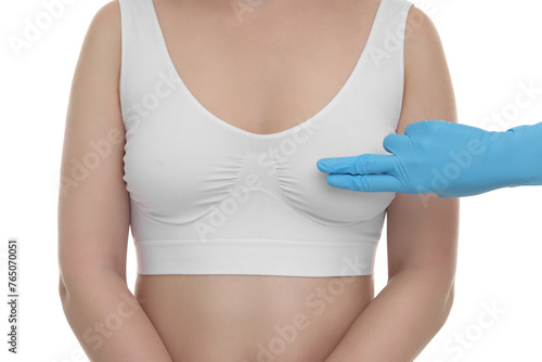 Mammologist checking woman's breast on white background, closeup © New Africa