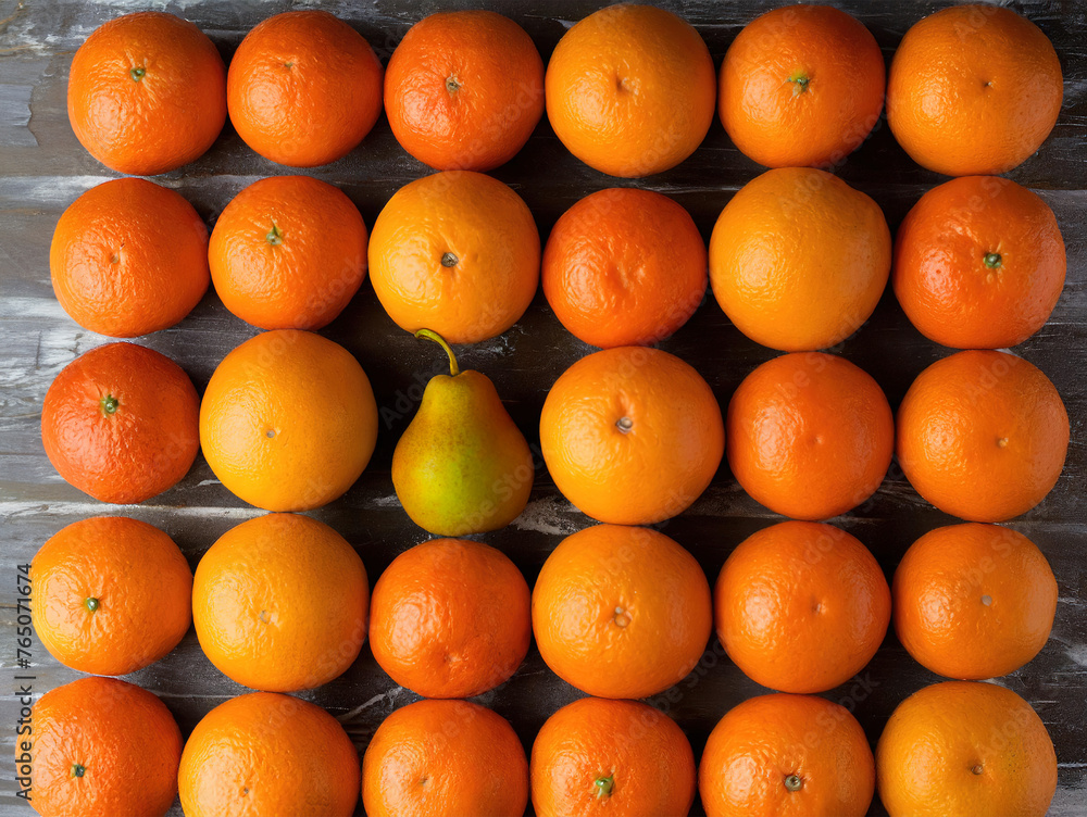 A row of oranges with a single pear in the middle