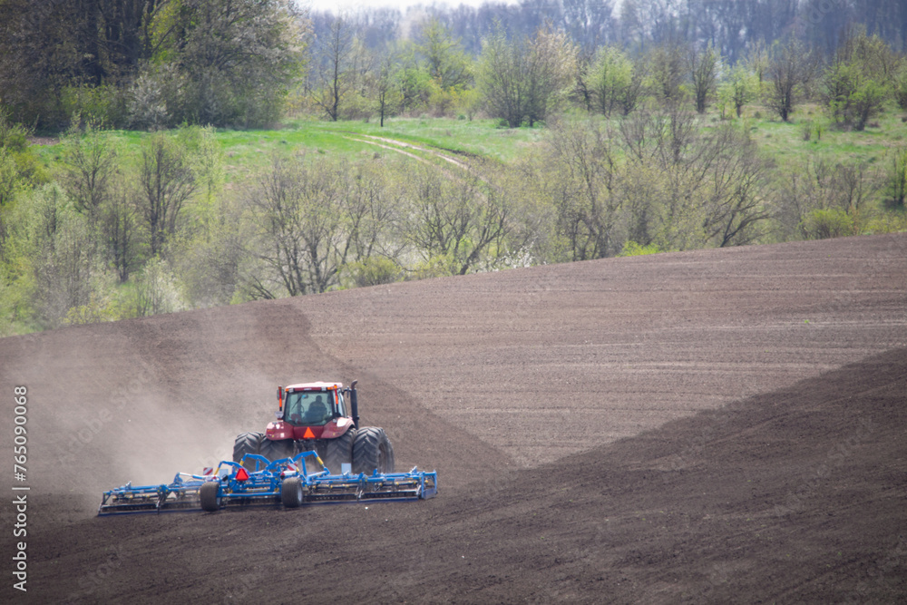 Fototapeta premium Cultivating the Future: Tractor Leading Agriculture Forward