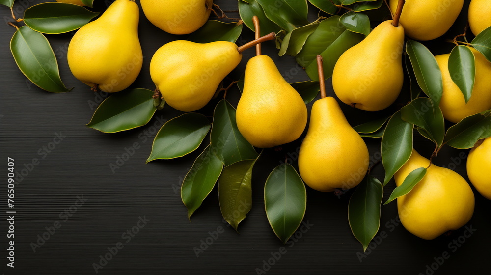 Fresh ripe pears with leaves on a dark wooden background. Design for advertising, poster, packaging, postcard.