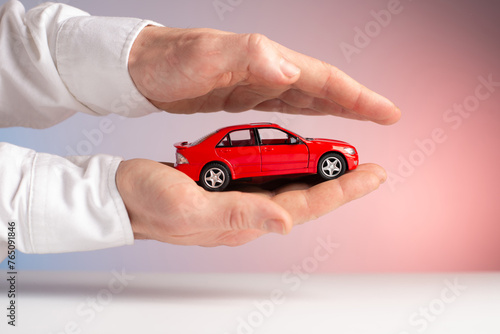 concept : car insurance red car accident in hand