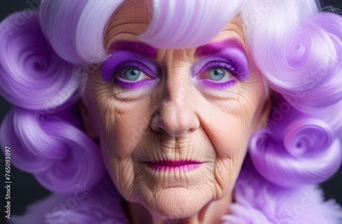 portrait of old woman with purple make up and hair artistically styled against dark background. concepts: artistic expression, creative hairstyles, unusual old people, bright old age, fashion trends photo