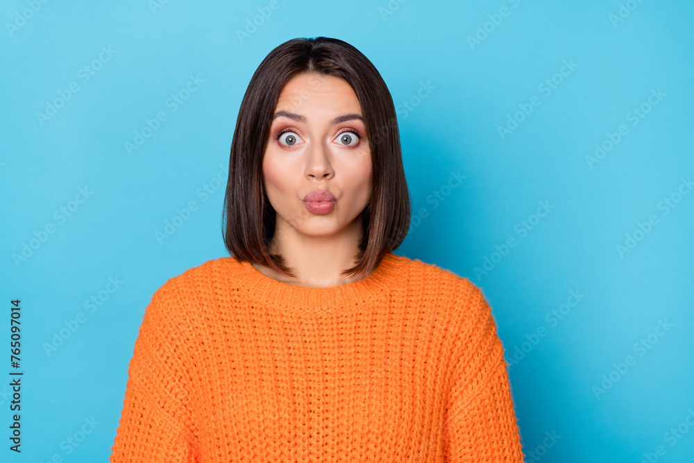 Portrait of attractive funny affectionate amazed girl sending you air kiss isolated over bright blue color background Portrait of attractive funny affectionate amazed girl sending you air kiss isolated over bright blue color background