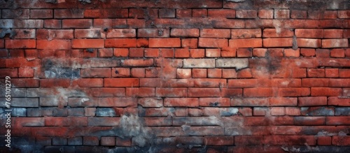 A solid brick wall featuring a single red brick placed prominently in the center