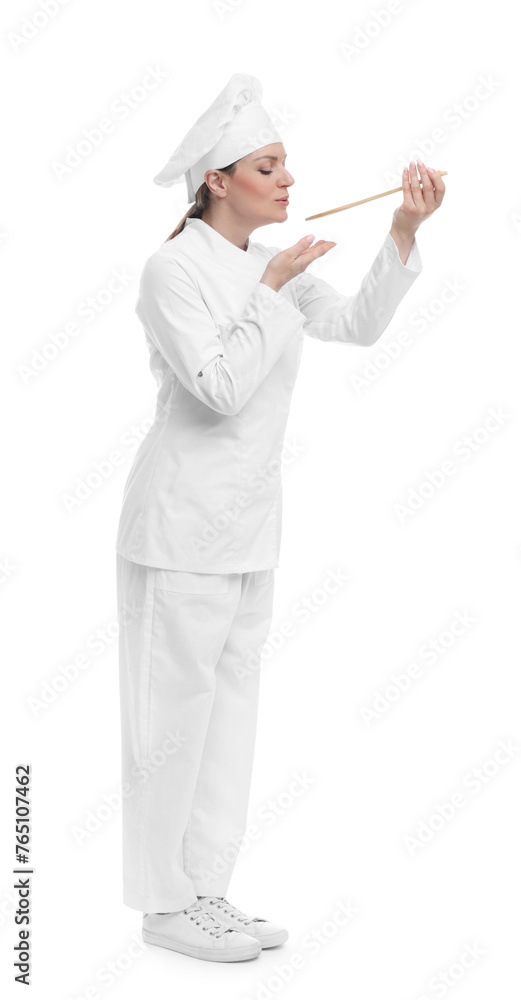 Happy chef in uniform tasting something on white background Happy chef in uniform tasting something on white background