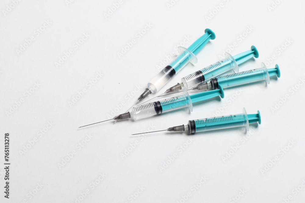 syringe on white syringe on white