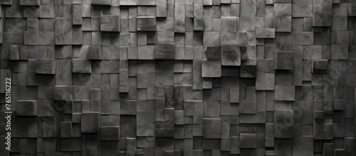 A monochrome image featuring a wall constructed with blocks of wood, creating a textured and unique surface © 2rogan