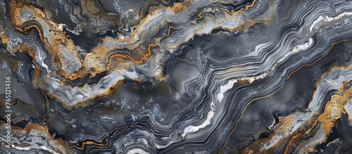 A detailed view showcasing a black and gold marble slab featuring an intricate pattern of wavy lines