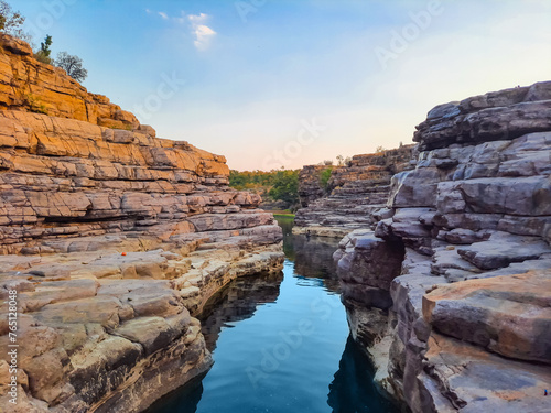 A beautiful lake surrounded by rocky mountain at Chidiya Bhadak, Indore, Madhya Pradesh, India.