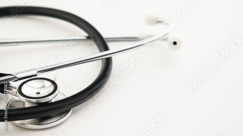 Professional stethoscope on a white background signifying medical examination and healthcare