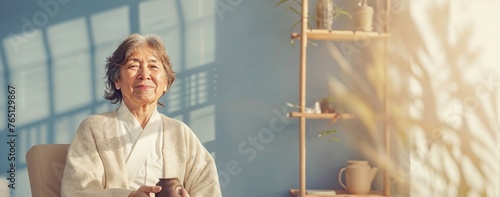 Elderly Woman Embodying Serenity in a Modern Tea Ceremony Setting