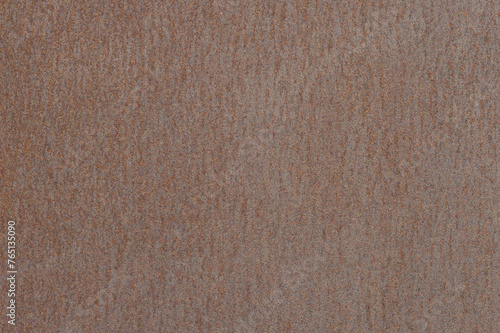 A rusty sheet of metal with a beautiful brown rust texture, iron background