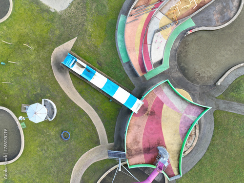 Aerial drone view on a childrens playground Slide and colorfull climbing and playing installations. The Netherlands.