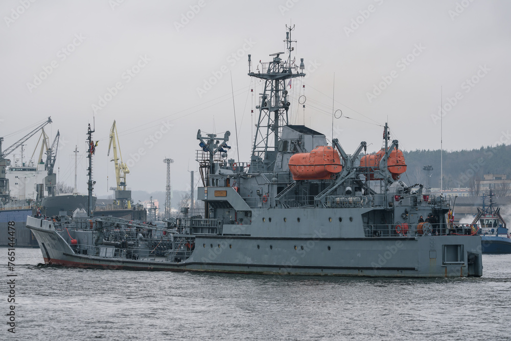 WARSHIP - A navy fuel tanker maneuvers in a seaport
WARSHIP - A navy fuel tanker maneuvers in a seaport