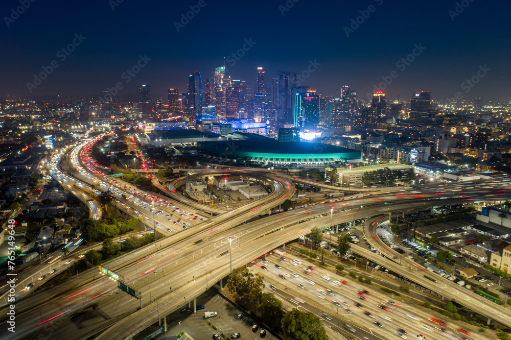 Downtown Los Angeles at night with rush hour traffic. Downtown Los Angeles at night with rush hour traffic.