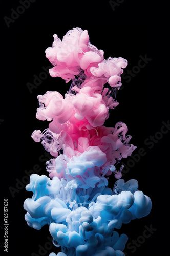 A group of blue and pink ink swirls and mixes in water, creating abstract patterns and wild splashes.