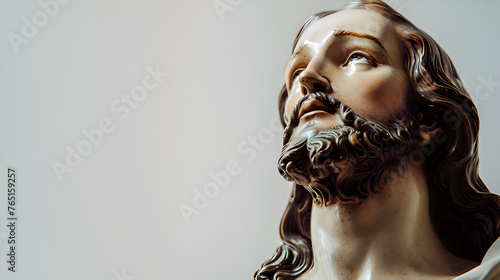 Statue of 'Jesus christ of Nazareth' on white background copy space 