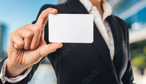 Businesswoman holding a Blank Business Card - Empty Business Card for Mockup - Template for Logo Design and Branding - Representation of Succesful Person