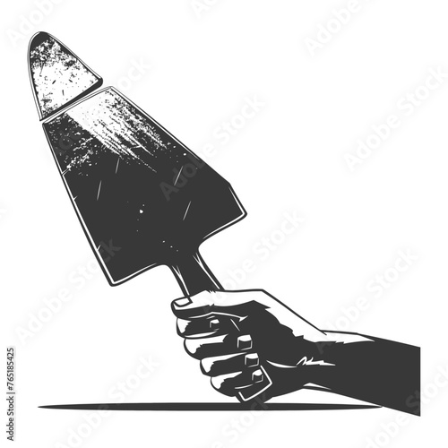 Silhouette hand holding brick trowel for construction black color only