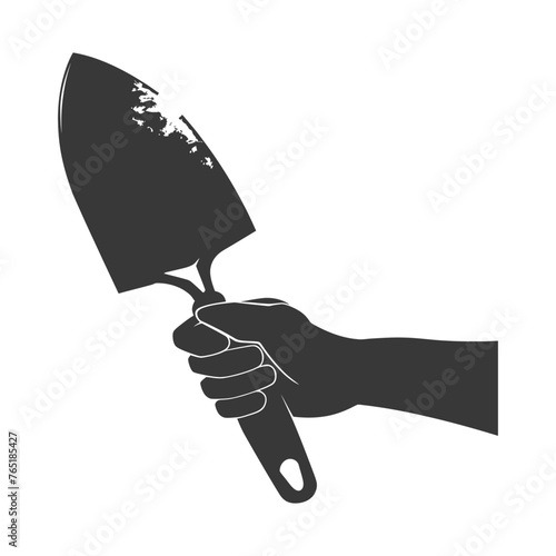 Silhouette hand holding brick trowel for construction black color only