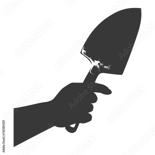 Silhouette hand holding brick trowel for construction black color only