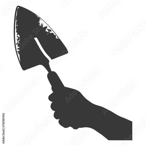 Silhouette hand holding brick trowel for construction black color only