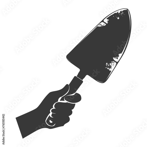 Silhouette hand holding brick trowel for construction black color only