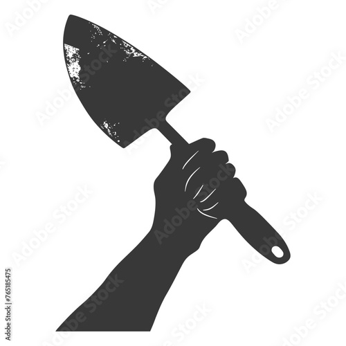 Silhouette hand holding brick trowel for construction black color only