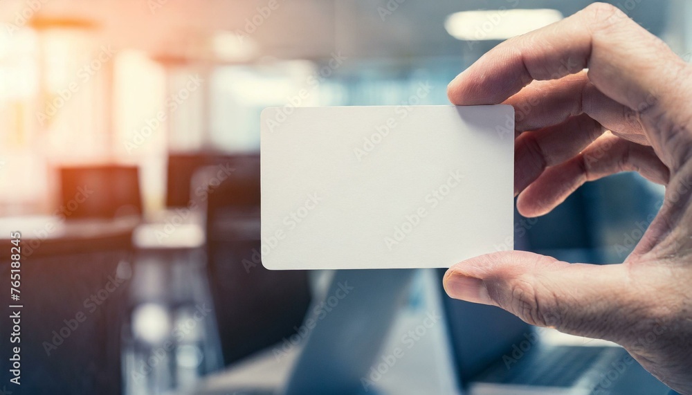 Businessman holding a Blank Business Card - Empty Business Card for Mockup - Template for Logo Design and Branding - Representation of Succesful Person Businessman holding a Blank Business Card - Empty Business Card for Mockup - Template for Logo Design and Branding - Representation of Succesful Person