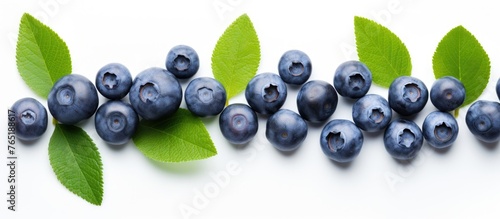Blueberries on a white surface
