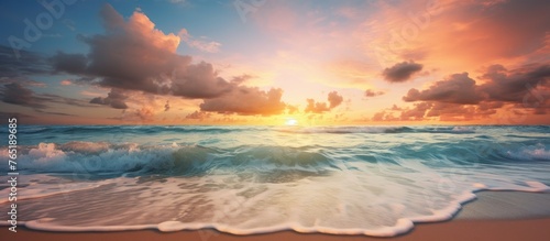 Sunset over ocean with waves on beach © Ilgun