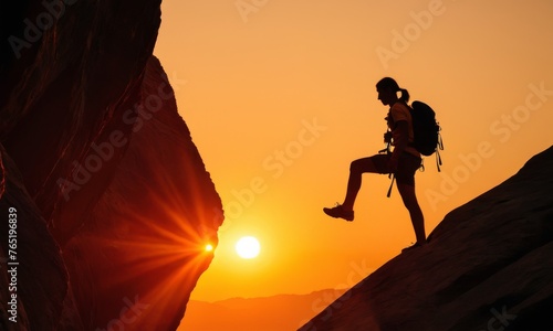 A hiker exults on a mountain ridge against the radiant backdrop of a rising sun, symbolizing achievement and the beauty of nature. The first rays of light bring warmth and vision to the landscape.