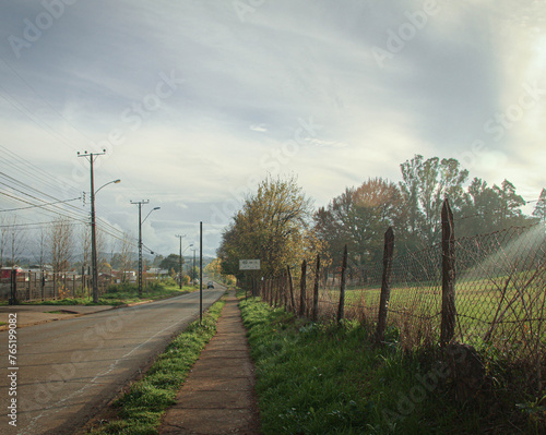 I walk in a sunny town in southern Chile. 