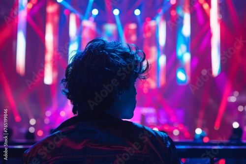 Excited performer backstage gazing at the vibrant Eurovision stage encapsulating the anticipation and glamour of the event