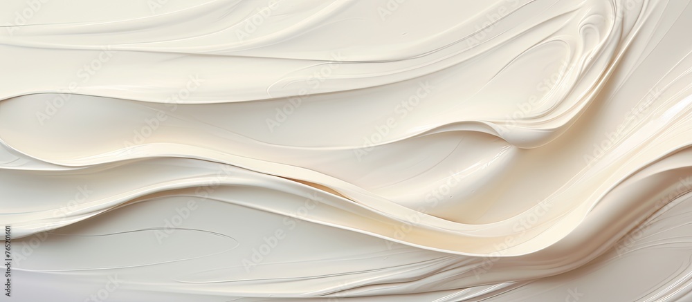A close-up picture of a white cake decorated with a distinctive swirl of icing on top A close-up picture of a white cake decorated with a distinctive swirl of icing on top