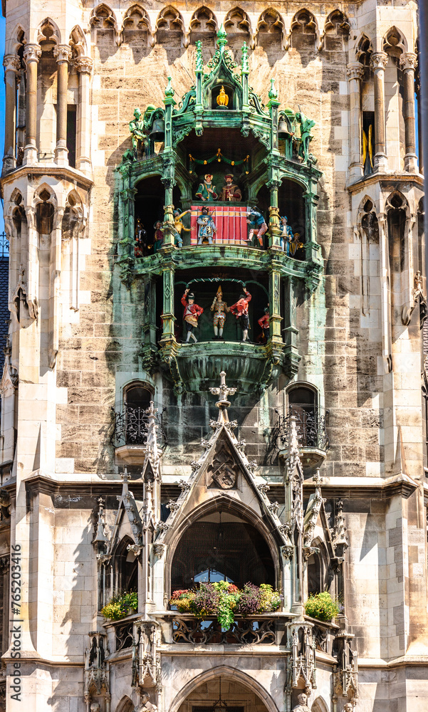 Panoramic view of theatrical puppet show on tower in Marienplatz town hall of Marien Square in Munich, Bavaria, Germany