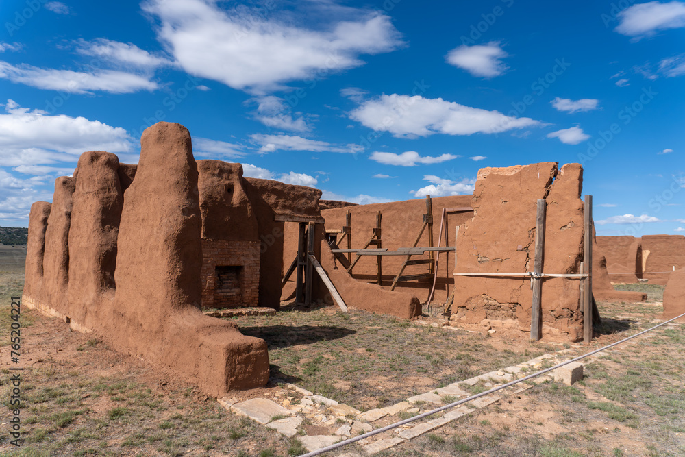 Fort Union National Monument in New Mexico. Preserves fort's adobe ruins along Santa Fe Trail. Crumbling walls are shored up by wood bracing. 