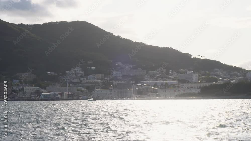 Waterfront Houses With Mount Hakodate in Background in Hokkaido, Japan Waterfront Houses With Mount Hakodate in Background in Hokkaido, Japan