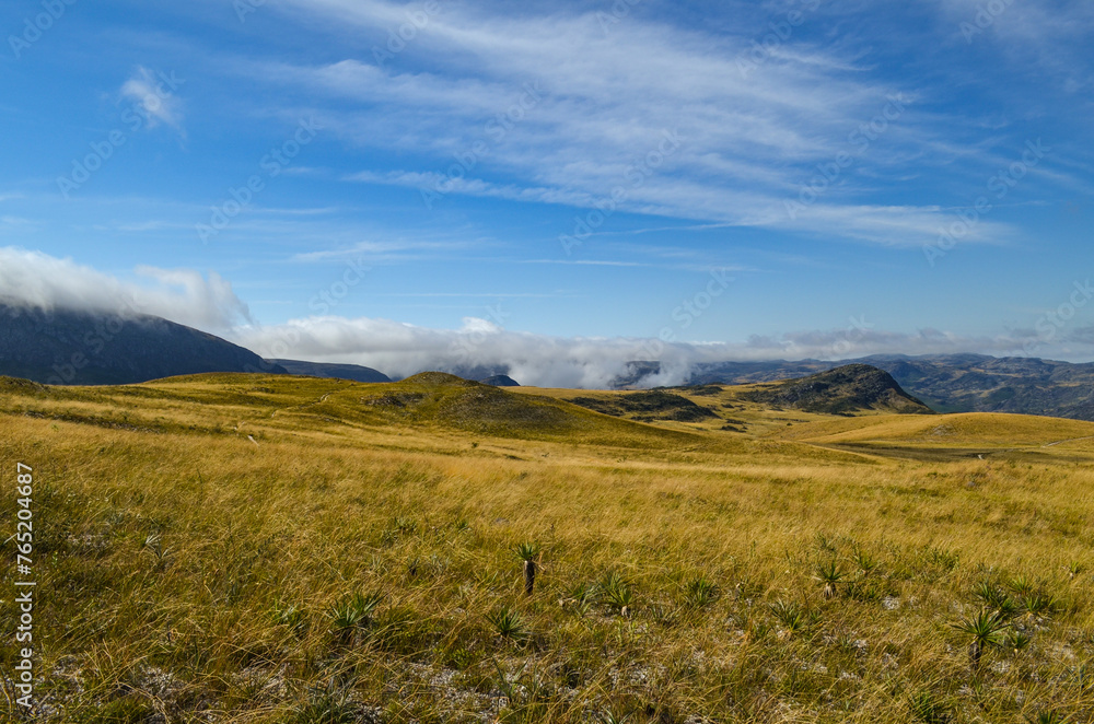 Fototapeta premium Sunlight at dusk in the mountains of the Serra do Cipó region in Minas Gerais, Brazil