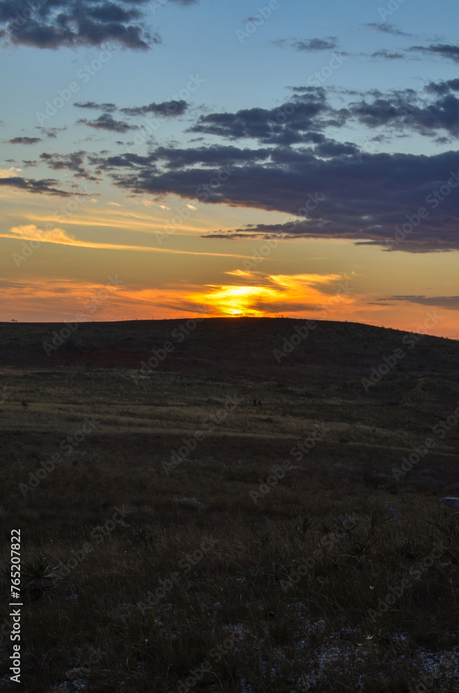Fototapeta premium Sunlight at dusk in the mountains of the Serra do Cipó region in Minas Gerais, Brazil