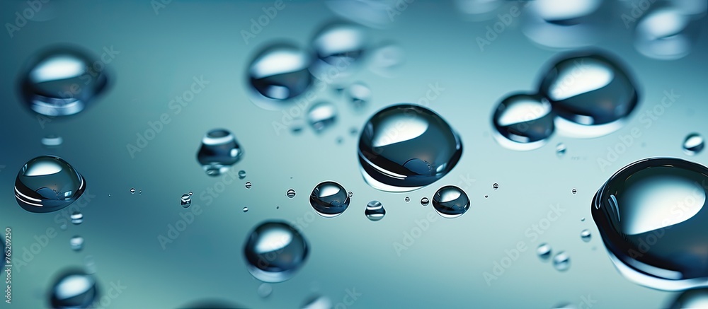Capture of multiple water droplets seen up close on a flat surface